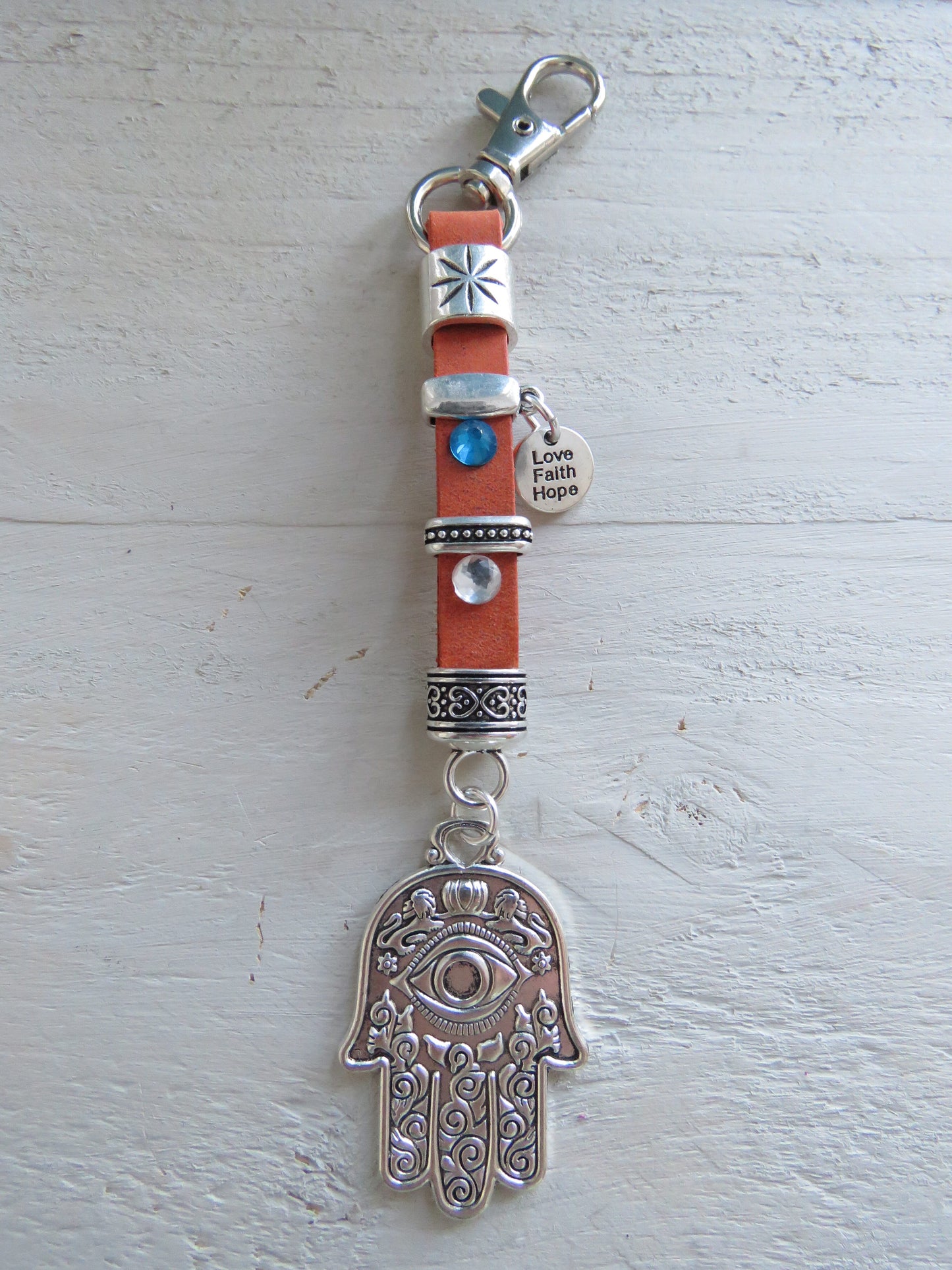 Sleutelhanger/tashanger van leer (hamsa hand)