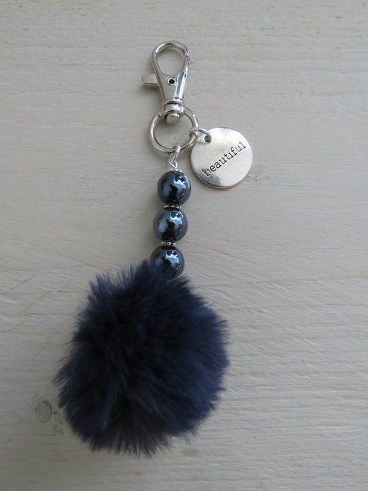 Sleutel-/tashanger Pompon