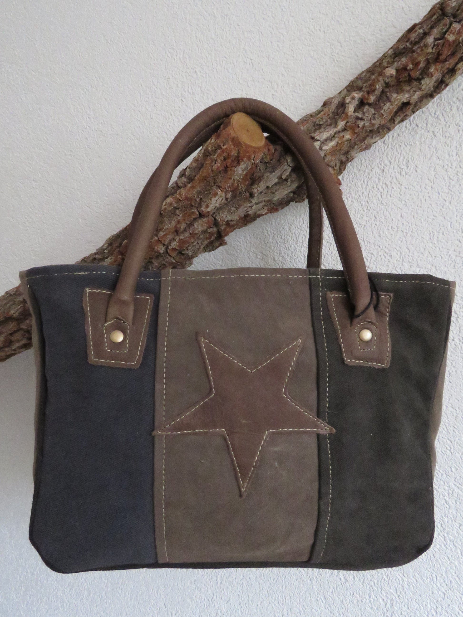 Hand/schoudertas van canvas en leer (ster)