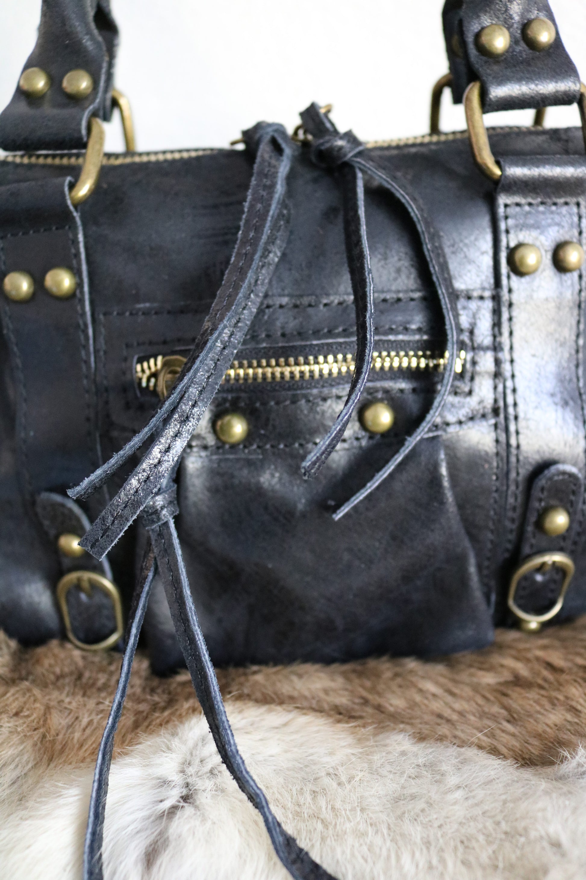 hand-/schouder-/crossbody tas van leer
